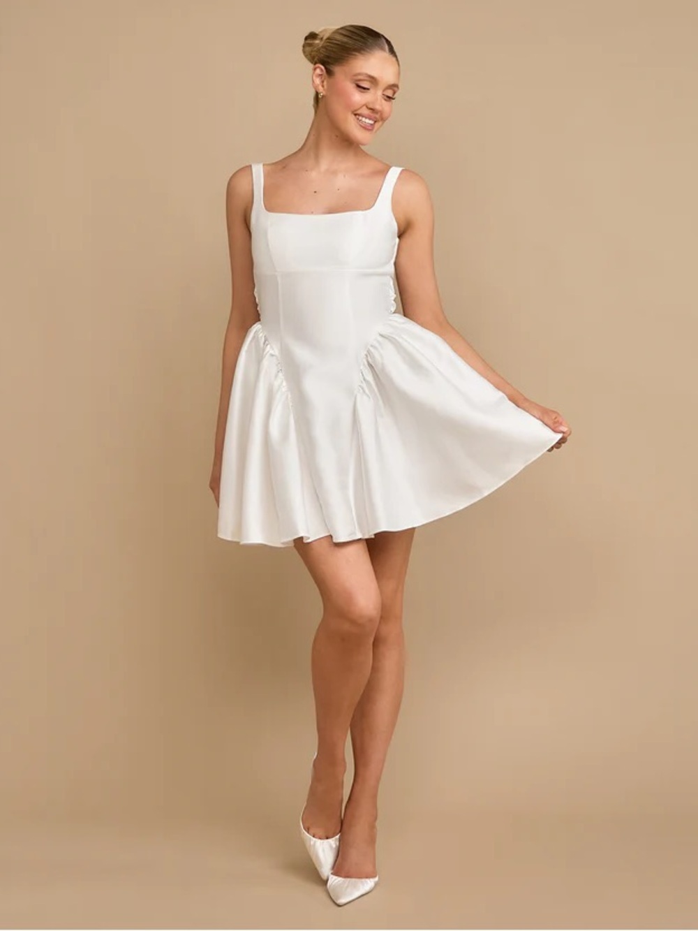 Six Stories CHARLOTTE
Satin Bow Back Pleated Skirt Mini Dress